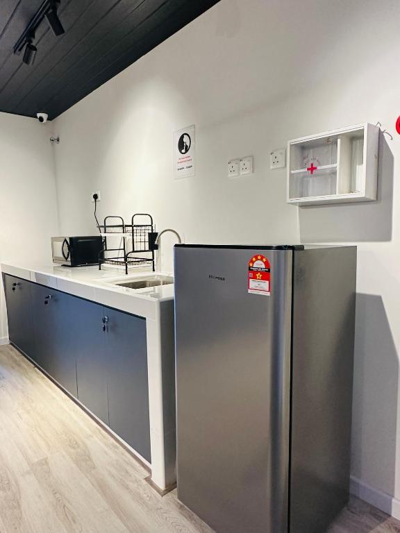 Kuchyň nebo kuchyňský kout v ubytování Cozii Home Marang