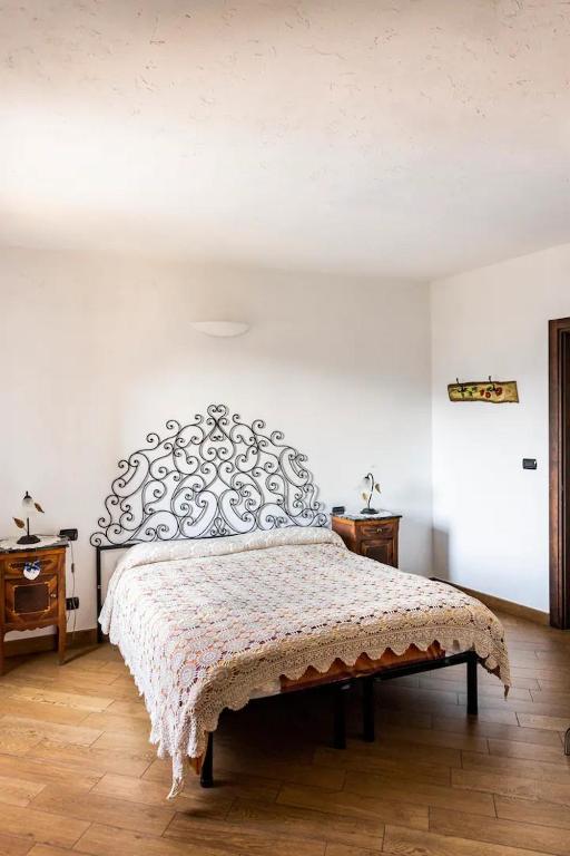A bed or beds in a room at Bed & Breakfast L'erica