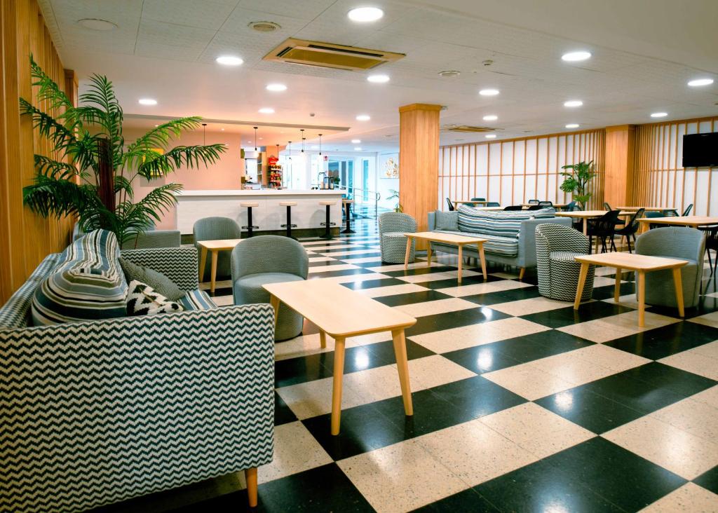 Posezení v ubytování Hotel S'Agoita