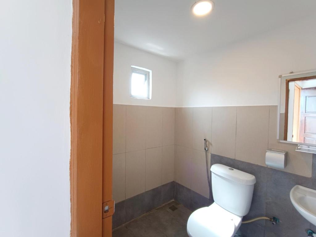 Koupelna v ubytování Shoreline Guesthouse 海岸线客栈