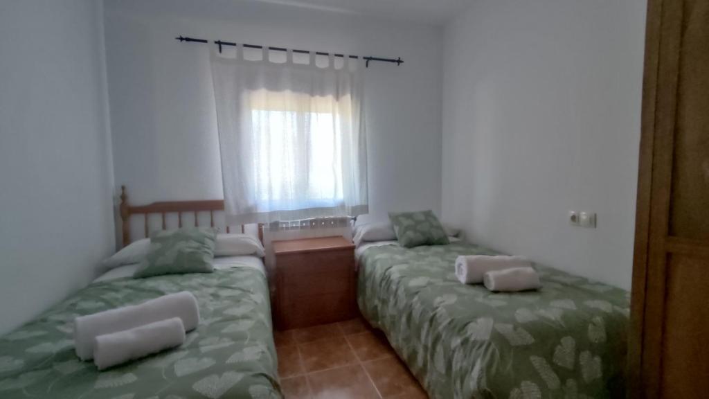 Postel nebo postele na pokoji v ubytování CR La Carrasca