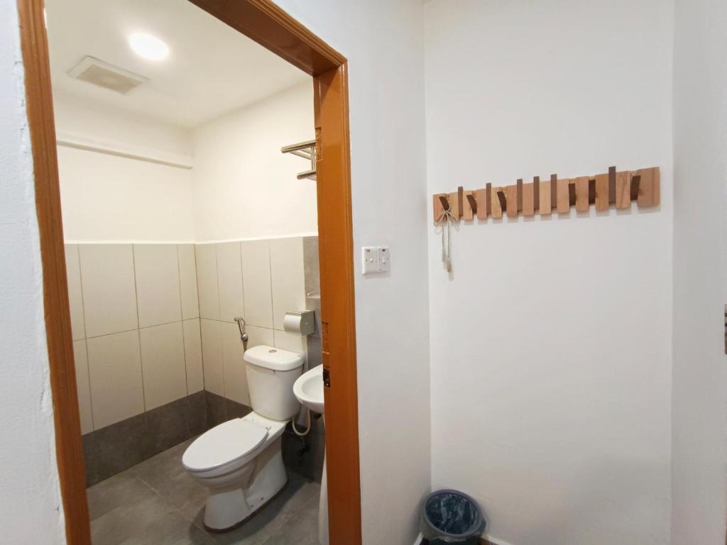 Koupelna v ubytování Shoreline Guesthouse 海岸线客栈