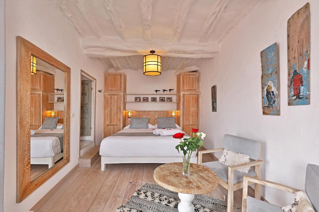 Postel nebo postele na pokoji v ubytování Riad Villa Garance
