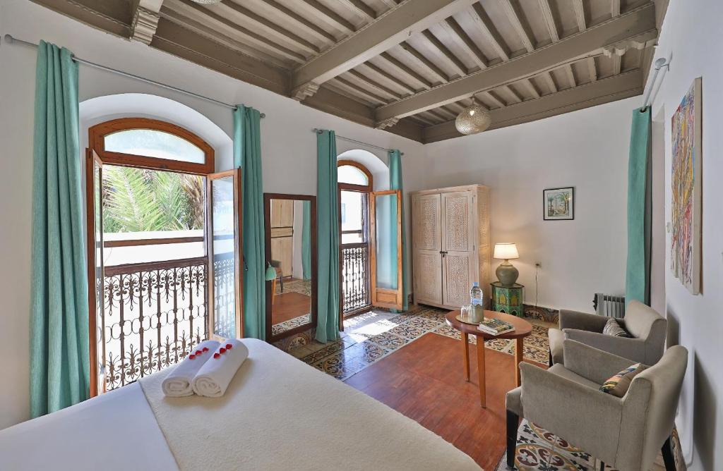 Postel nebo postele na pokoji v ubytování Riad Villa Garance