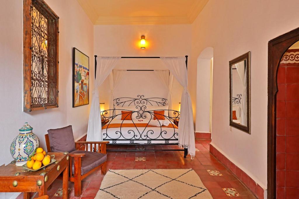 Postel nebo postele na pokoji v ubytování Riad Villa Garance