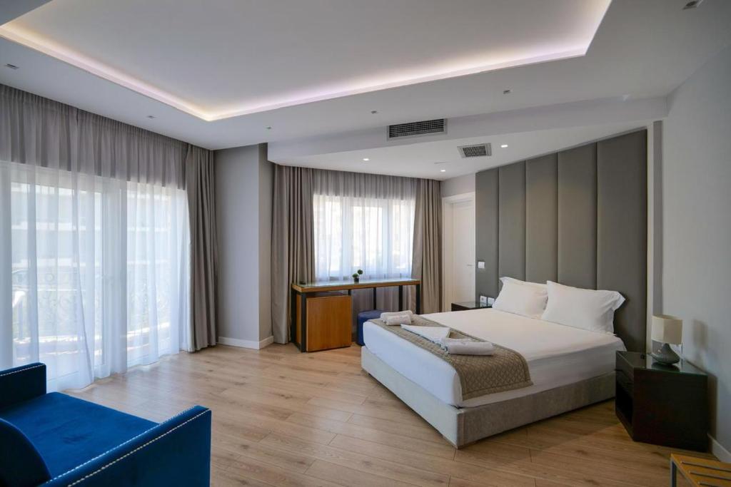 Postel nebo postele na pokoji v ubytování AMI MAR Hotel