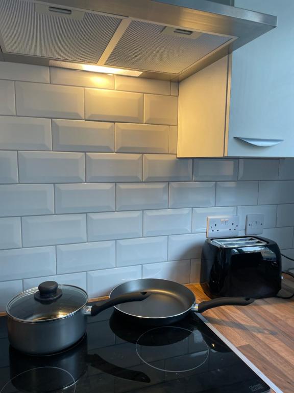 Kuchyň nebo kuchyňský kout v ubytování Luton Home