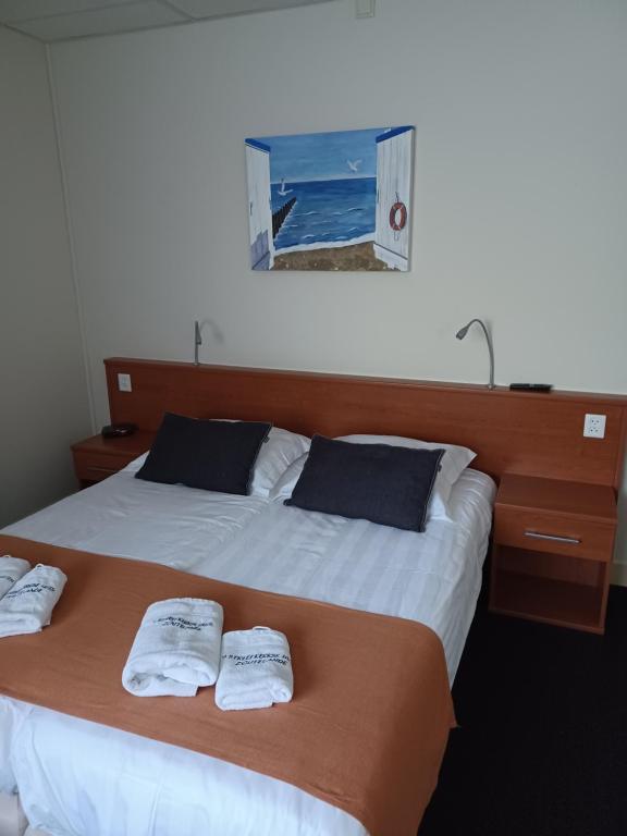 Postel nebo postele na pokoji v ubytování 't Streefkerkse Huis