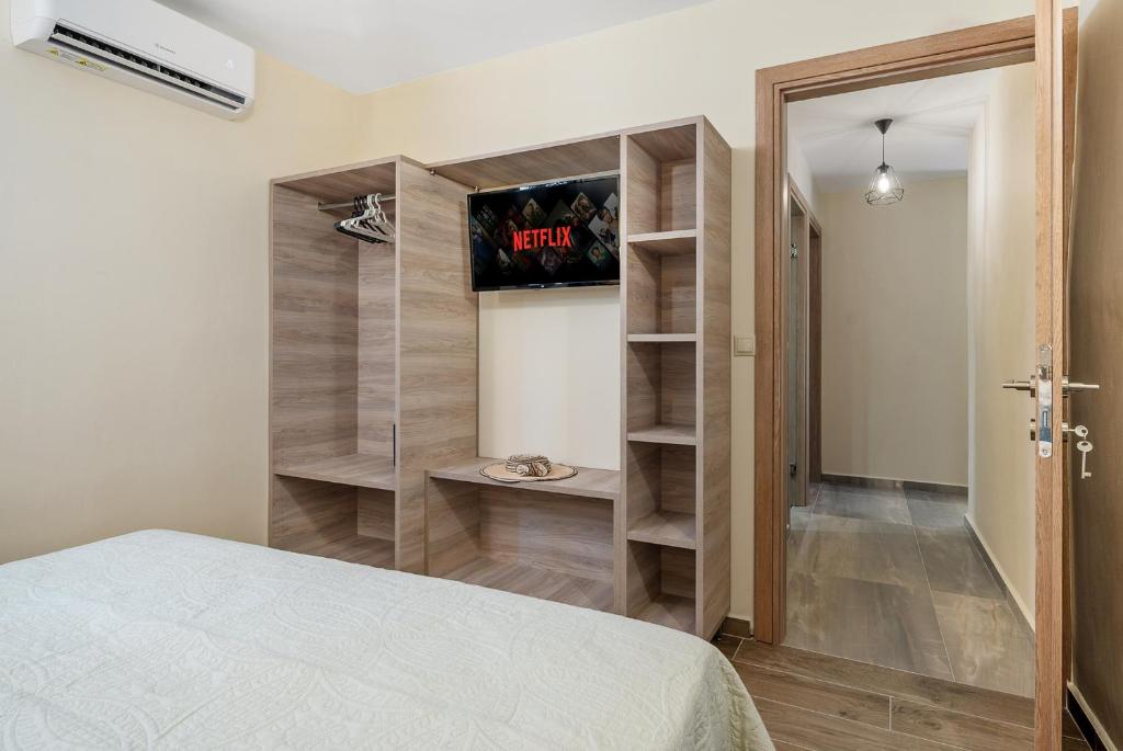 Postel nebo postele na pokoji v ubytování Ioanna's Home