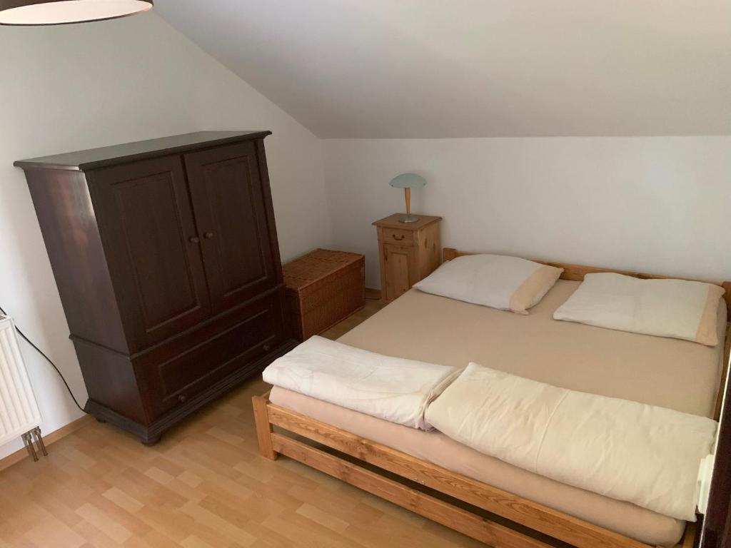 Postel nebo postele na pokoji v ubytování Tyllichova Chata