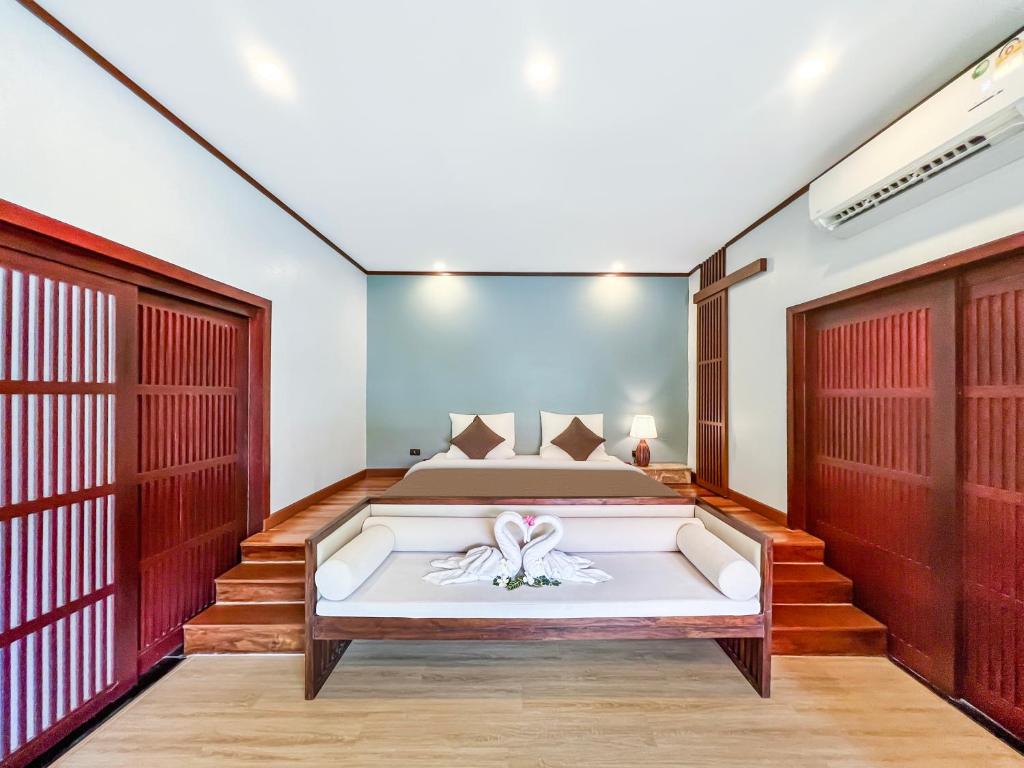 Postel nebo postele na pokoji v ubytování begonia N7 villa resort海棠7号别墅酒店