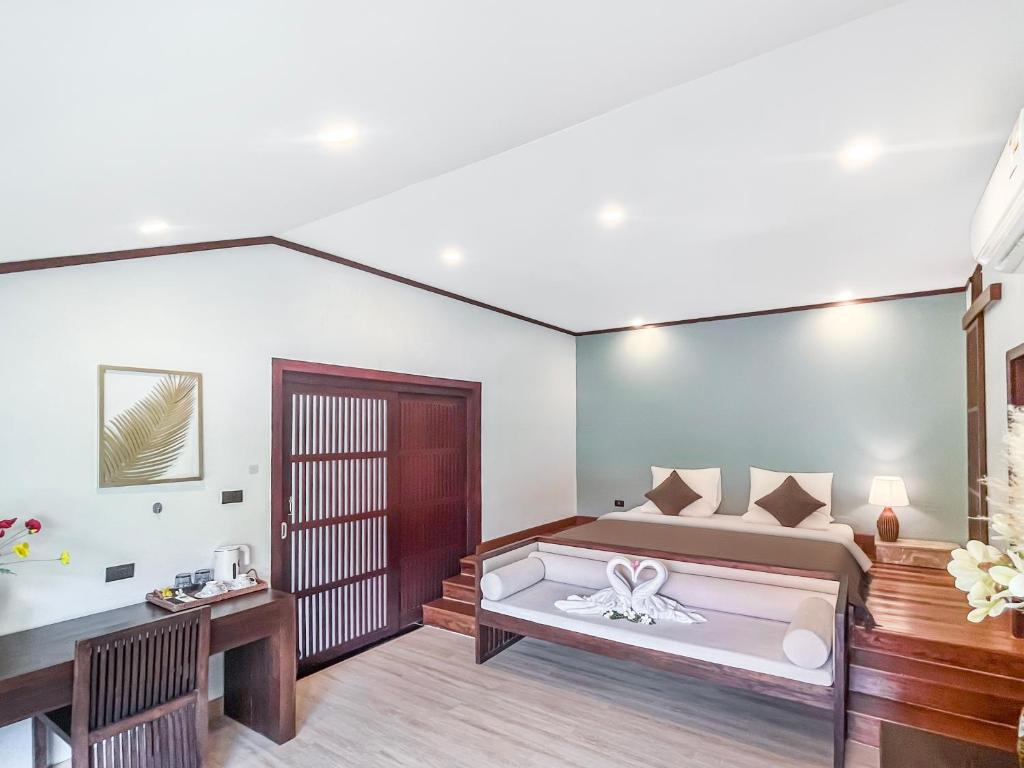Postel nebo postele na pokoji v ubytování begonia N7 villa resort海棠7号别墅酒店