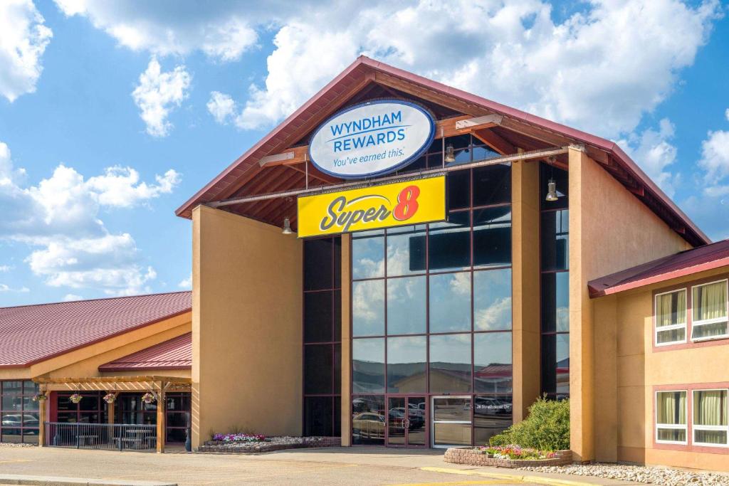 a supermarket with a sign on the front of it at Super 8 by Wyndham Sherwood Park/Edmonton Area in Sherwood Park