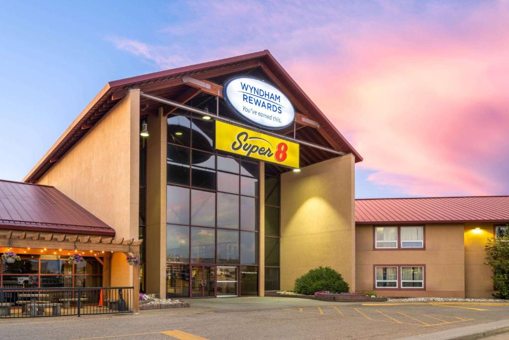 a store with a sign on the front of it at Super 8 by Wyndham Sherwood Park/Edmonton Area in Sherwood Park