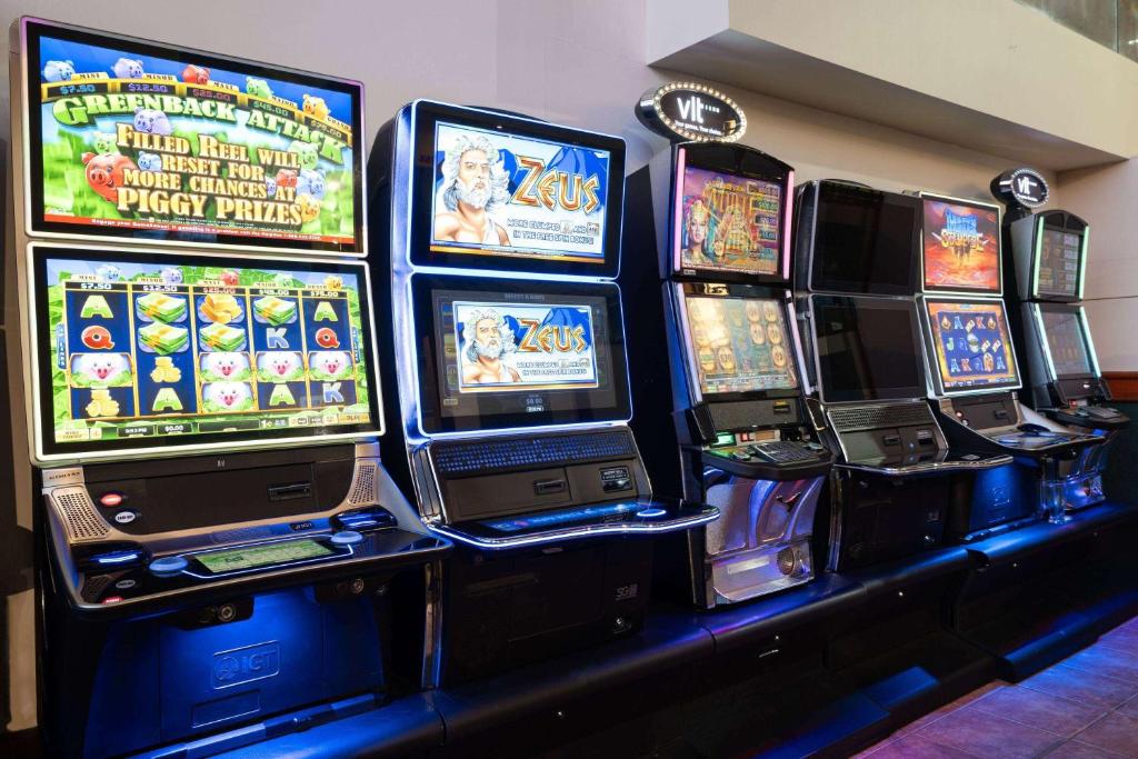 a bunch of video games on a display at Super 8 by Wyndham Sherwood Park/Edmonton Area in Sherwood Park