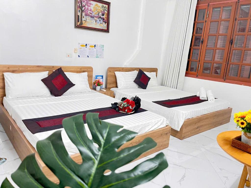 Postel nebo postele na pokoji v ubytování fortuna homestay