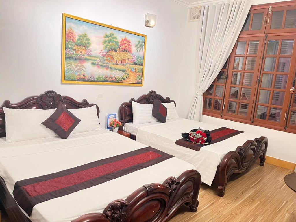 Postel nebo postele na pokoji v ubytování fortuna homestay