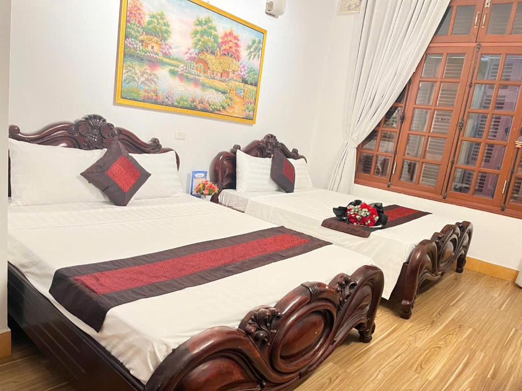 Postel nebo postele na pokoji v ubytování fortuna homestay