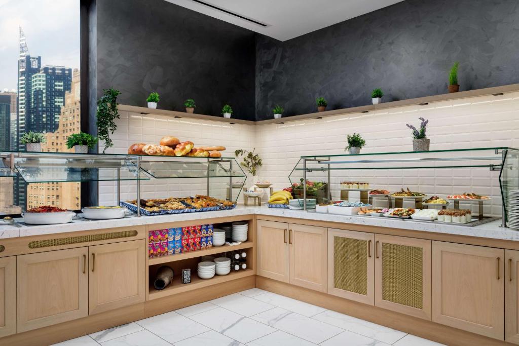 A cozinha ou cozinha compacta de Hilton New York Times Square