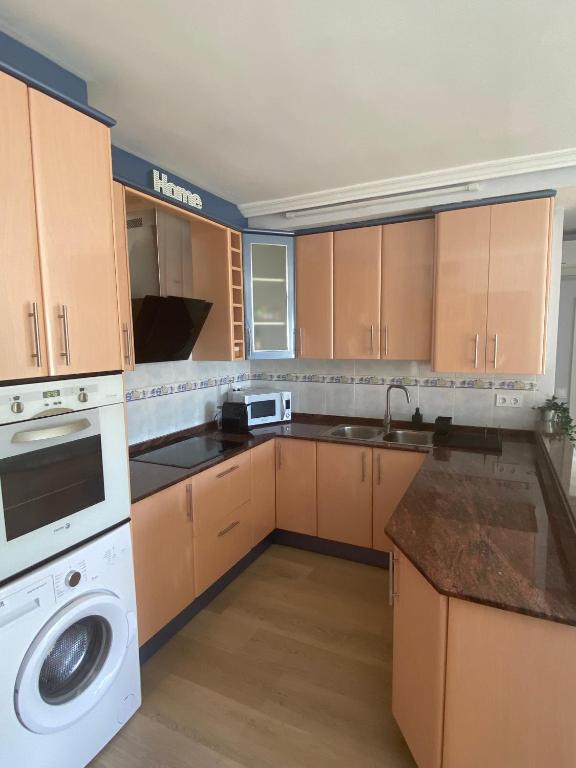 Kuchyňa alebo kuchynka v ubytovaní Sweet home Salou