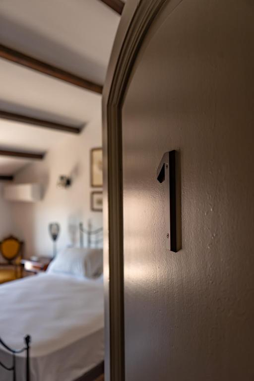 Postel nebo postele na pokoji v ubytování B&B Villa Argiolas