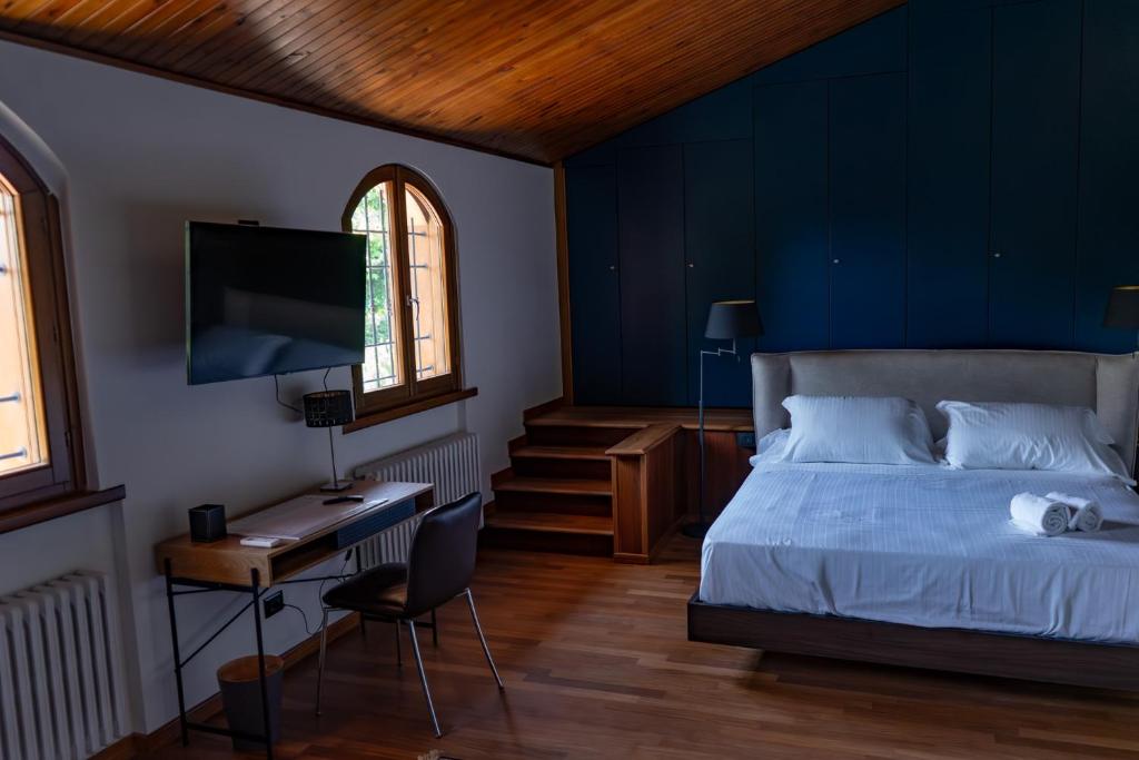 Postel nebo postele na pokoji v ubytování B&B Villa Argiolas
