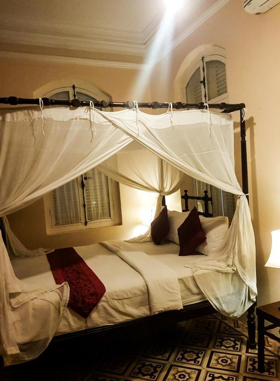 Postel nebo postele na pokoji v ubytování La Villa