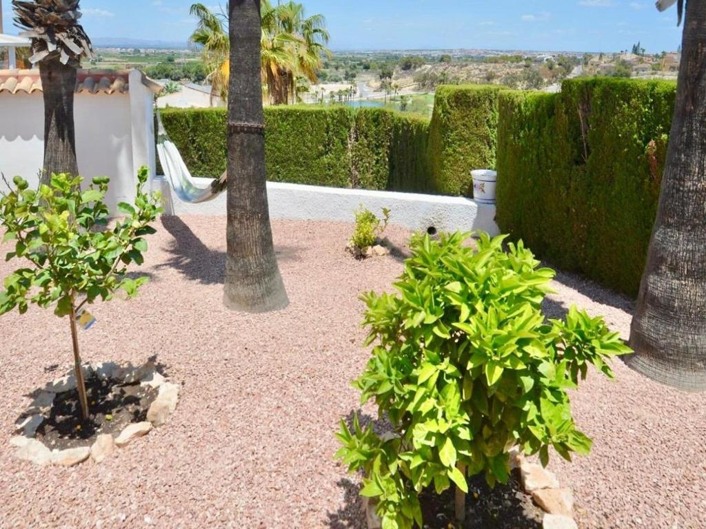 A garden outside Belvilla by OYO Villa Boya