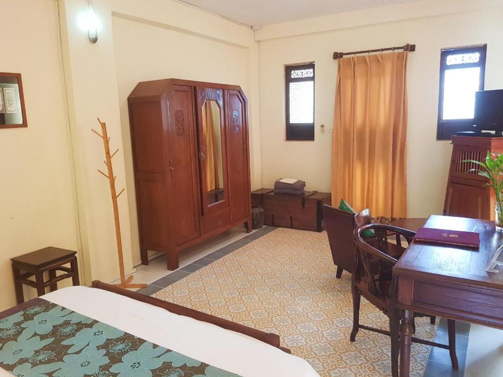 Postel nebo postele na pokoji v ubytování La Villa
