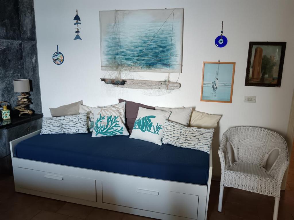 En eller flere senge i et værelse på La casa dell'azzurro