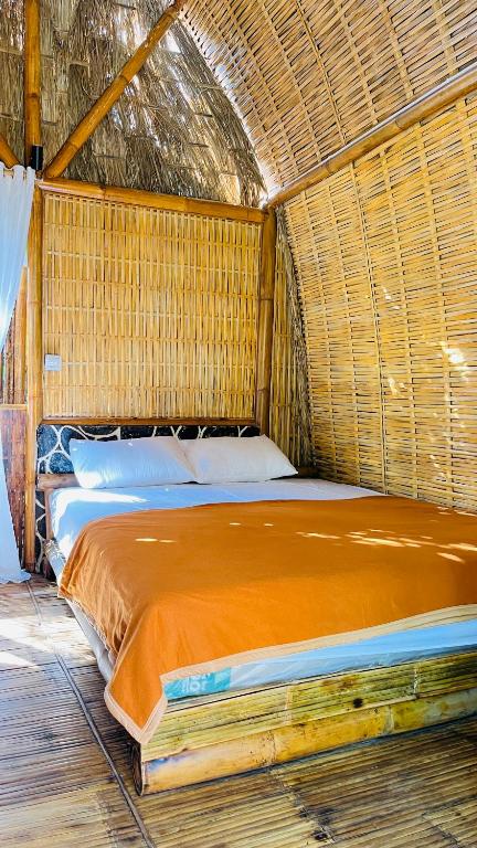 Postel nebo postele na pokoji v ubytování el bamboo guesthouse