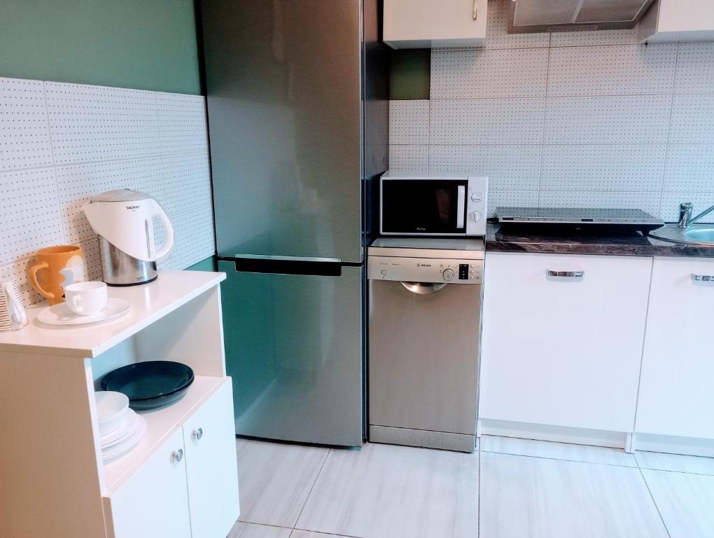 Dapur atau dapur kecil di Noclegi Joanna Trzcińska