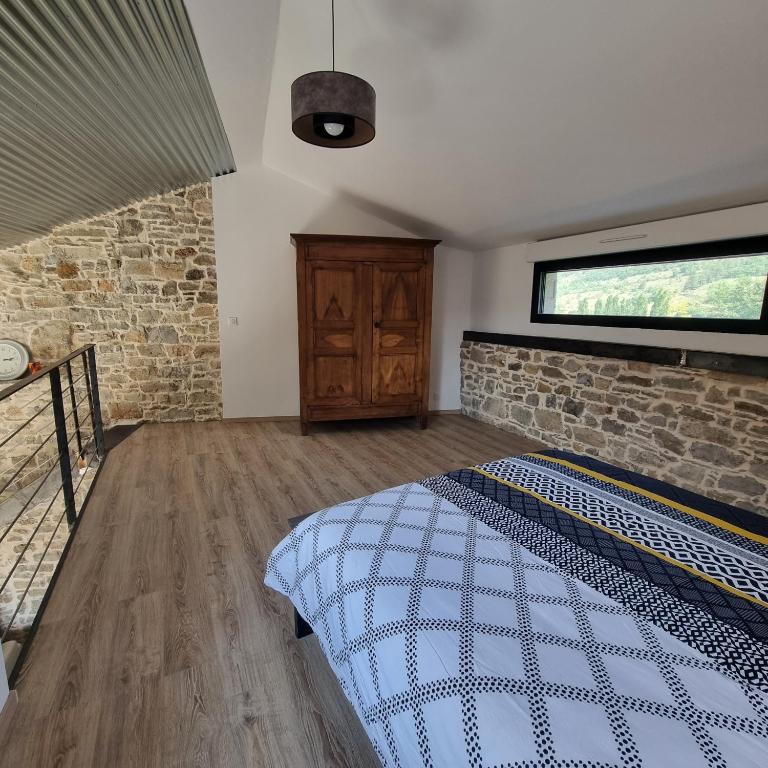 Postel nebo postele na pokoji v ubytování La Remise
