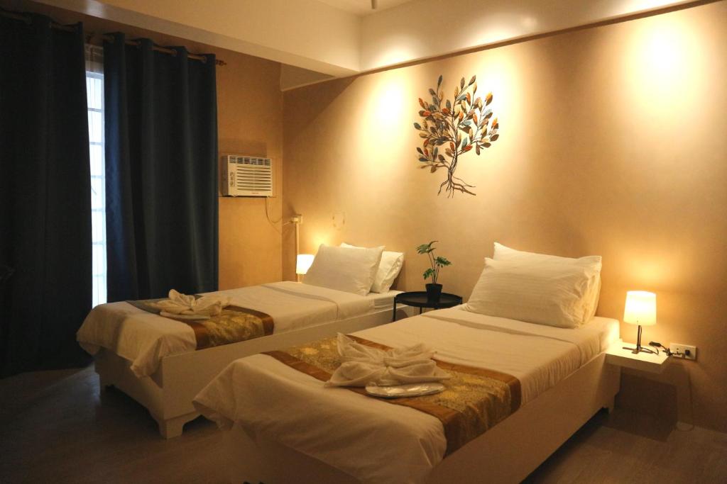 Postel nebo postele na pokoji v ubytování Hotel Casa Ilustre