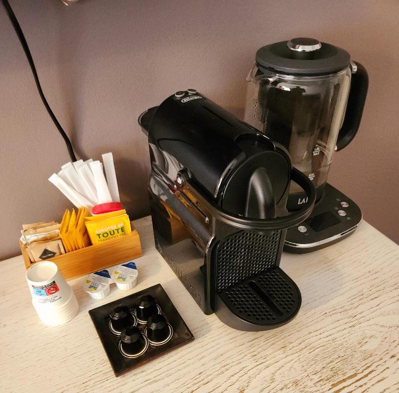 Příslušenství pro přípravu čaje a kávy v ubytování Gaia Suites - A due passi dal centro - Parcheggio privato