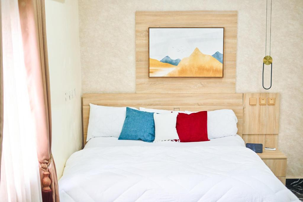 Postel nebo postele na pokoji v ubytování Cozy Cove Residence