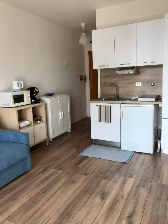 Kuchyň nebo kuchyňský kout v ubytování Monolocale a Torre Pellice