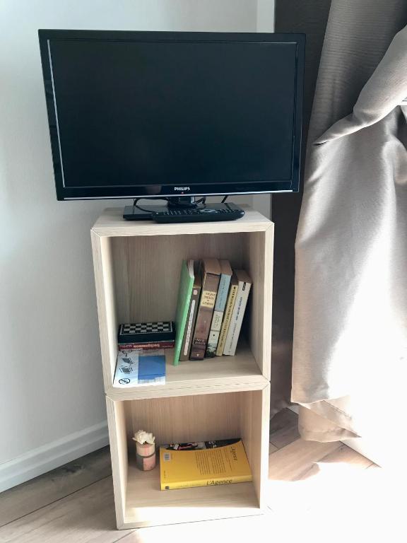 TV a/nebo společenská místnost v ubytování Monolocale a Torre Pellice