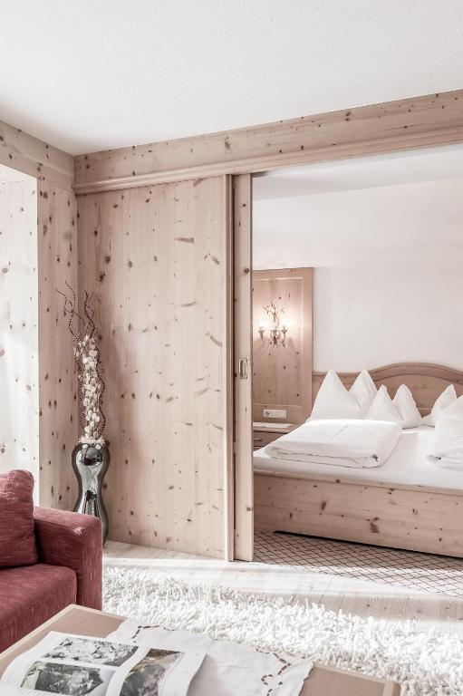 Postel nebo postele na pokoji v ubytování Hotel Olympia