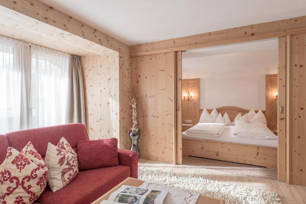 Postel nebo postele na pokoji v ubytování Hotel Olympia