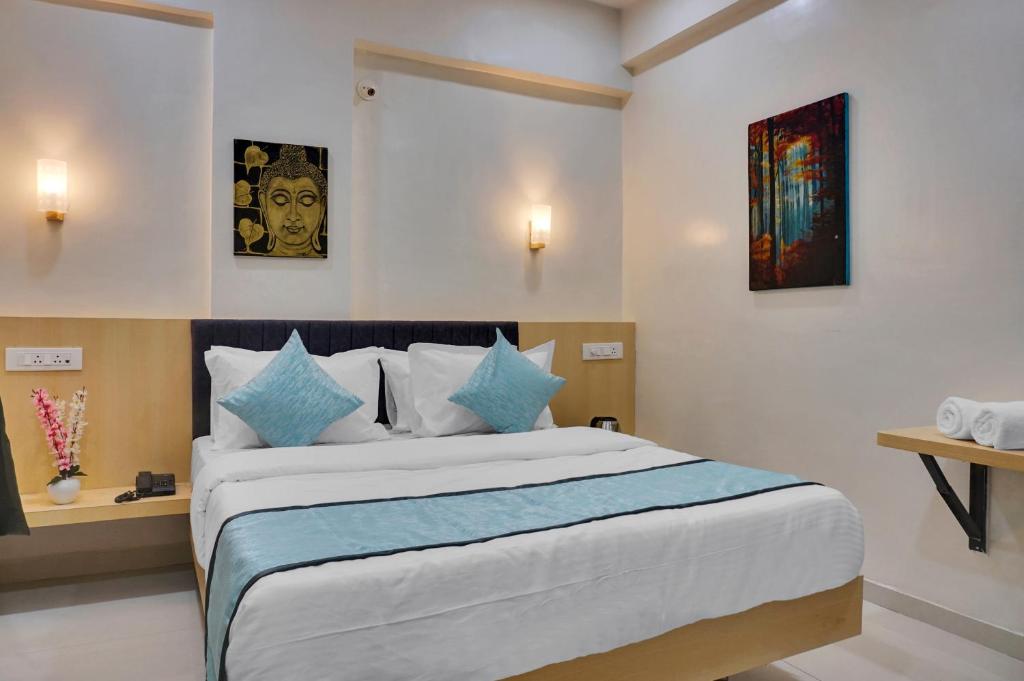 Postel nebo postele na pokoji v ubytování Urban Hometel