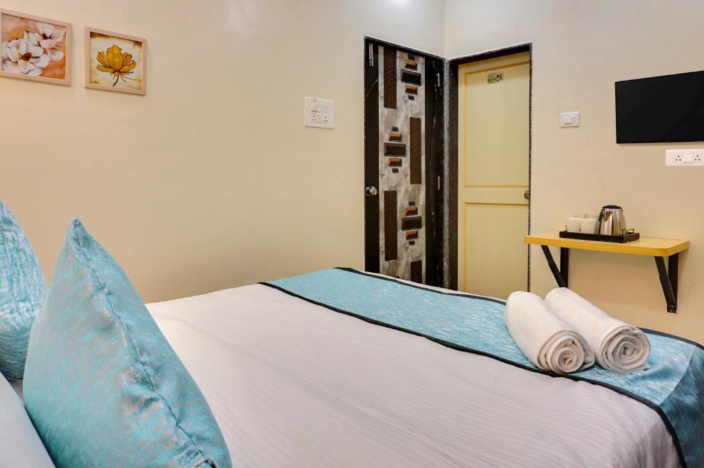 Postel nebo postele na pokoji v ubytování Urban Hometel