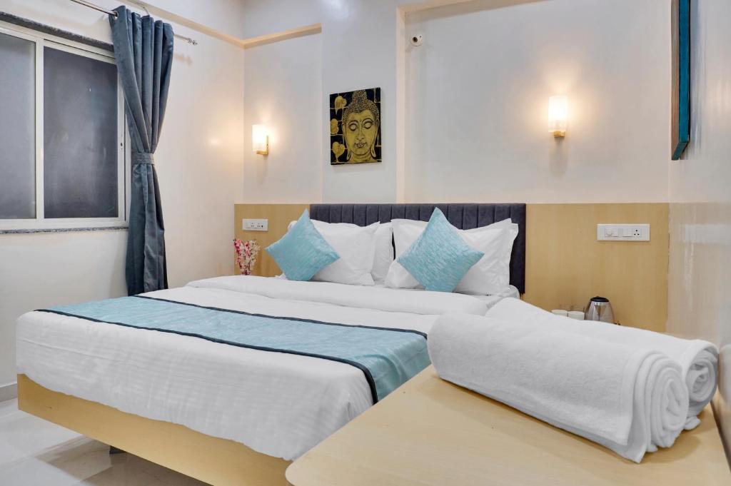 Postel nebo postele na pokoji v ubytování Urban Hometel