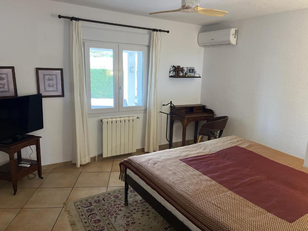 Postel nebo postele na pokoji v ubytování Villa Balcon al Mar