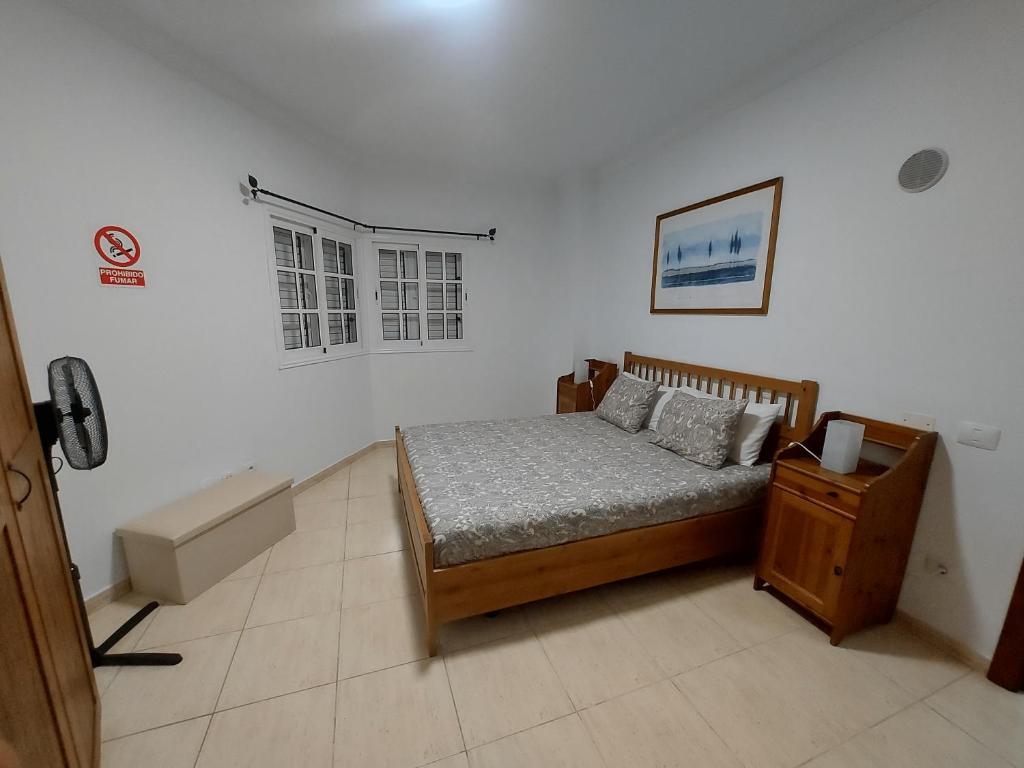 Postel nebo postele na pokoji v ubytování NIVARIA SUITE