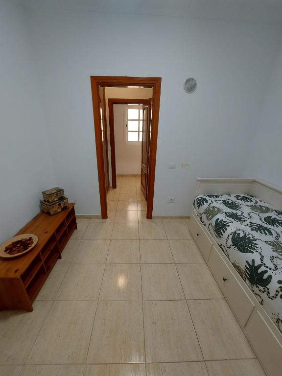 Postel nebo postele na pokoji v ubytování NIVARIA SUITE
