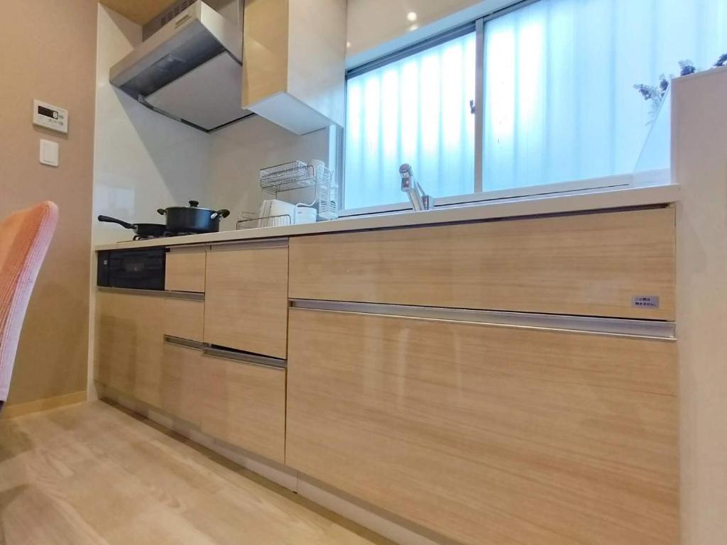12池袋最中心 两室一厅两浴室两卫生间 池袋站7分 2 rooms Ikebukuro center 7 mins to ST Max 8P 直达新宿 涉谷 表参道 池袋 上野 代代木 银座 原宿にあるキッチンまたは簡易キッチン