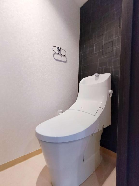 12池袋最中心 两室一厅两浴室两卫生间 池袋站7分 2 rooms Ikebukuro center 7 mins to ST Max 8P 直达新宿 涉谷 表参道 池袋 上野 代代木 银座 原宿にあるバスルーム