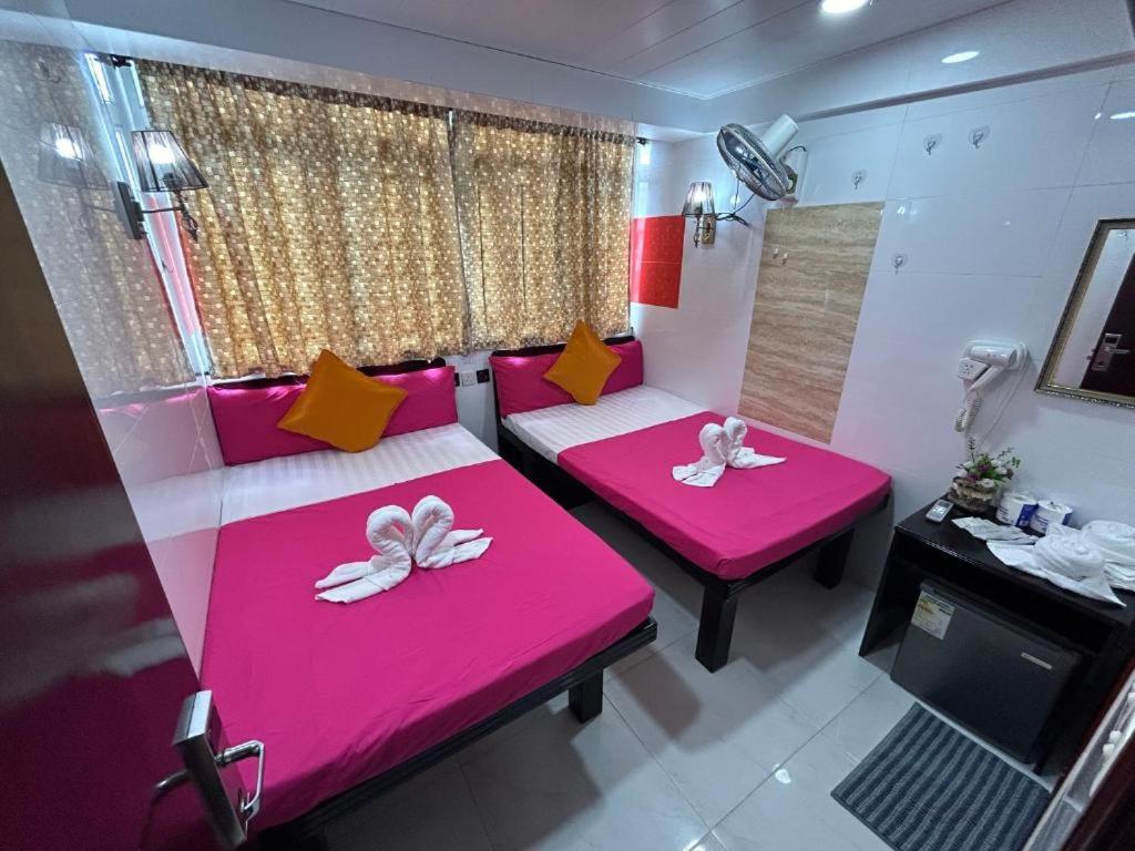 Postel nebo postele na pokoji v ubytování Premium Lounge