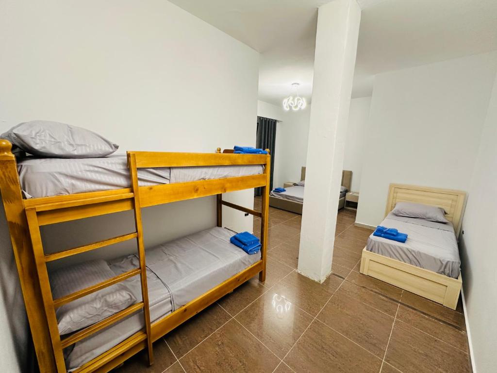 Postel nebo postele na pokoji v ubytování HOTEL SARDA